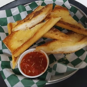 Grilled Wedges of Garlic Bread