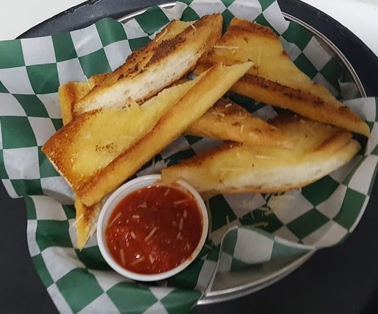 Grilled Wedges of Garlic Bread